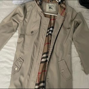 Burberry rain coat Measurements 16 1/2 inches across the shoulders